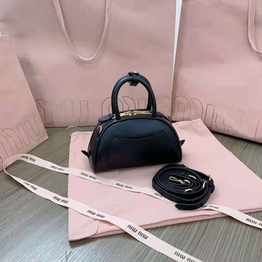 MC14 Medium Leather Top Handle Bag